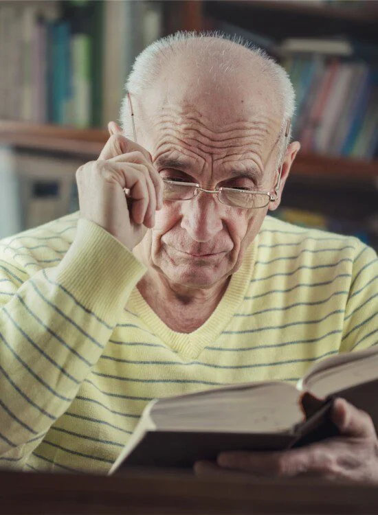 Senior man reading a book