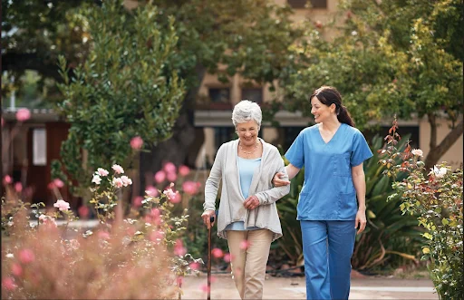 Nurse and senior woman going on a walk.