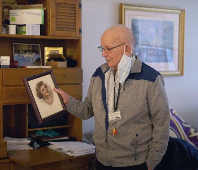 man holding picture